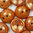 Piggy Beads weiß - orange bronze gelüstert 4x8mm 25Stk. Two-Hole-Beads